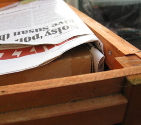 insulate hutch with newspaper